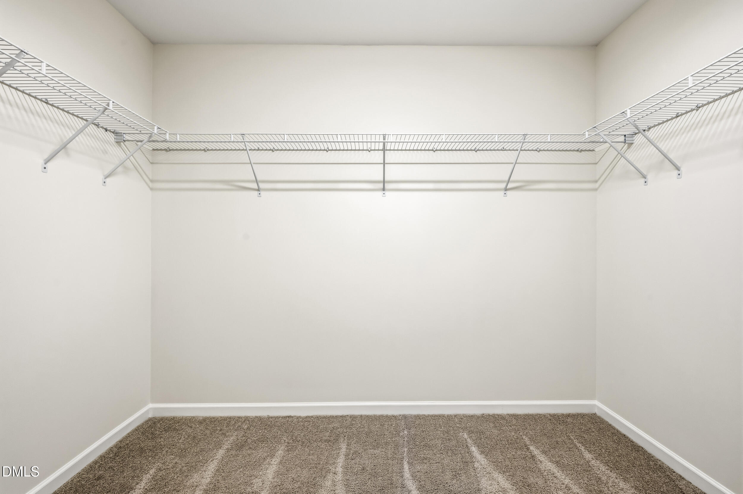 112 Ryder Cup Circle Raleigh, NC 27603 - Photo 26 of 45 a view of a room with racks on the wall