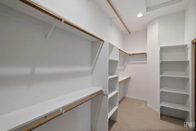 a kitchen with a stove and a refrigerator