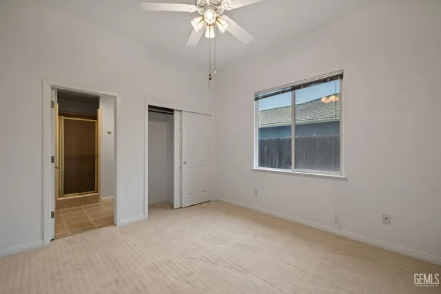 a swimming pool with wooden fence