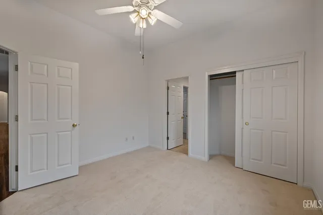a view of a house with swimming pool and a yard