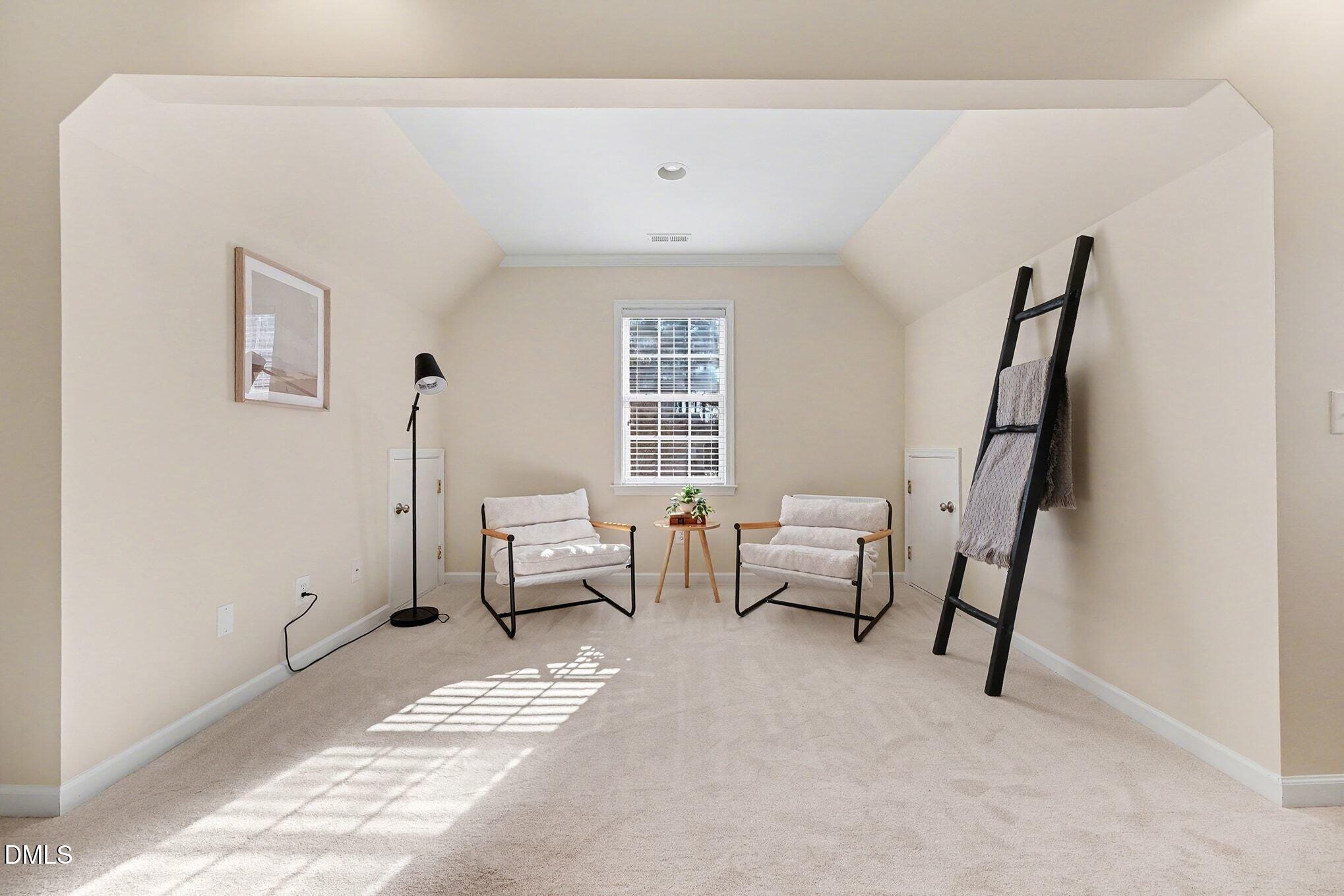 29 Chestnut Bluffs Lane Durham, NC 27713 - Photo 17 of 45 a bedroom with furniture and a window