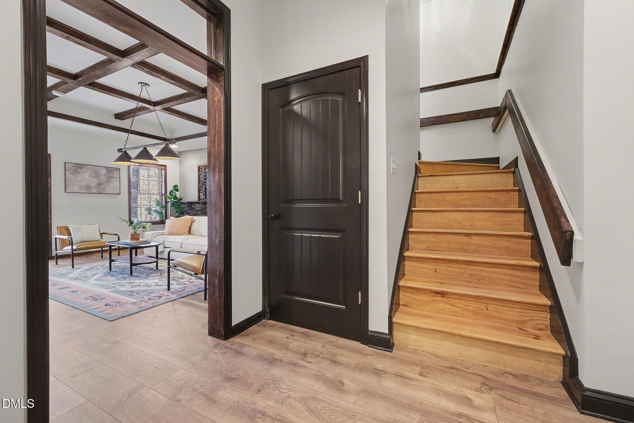 29 Chestnut Bluffs Lane Durham, NC 27713 - Photo 23 of 45 a view of entryway and hall with wooden floor