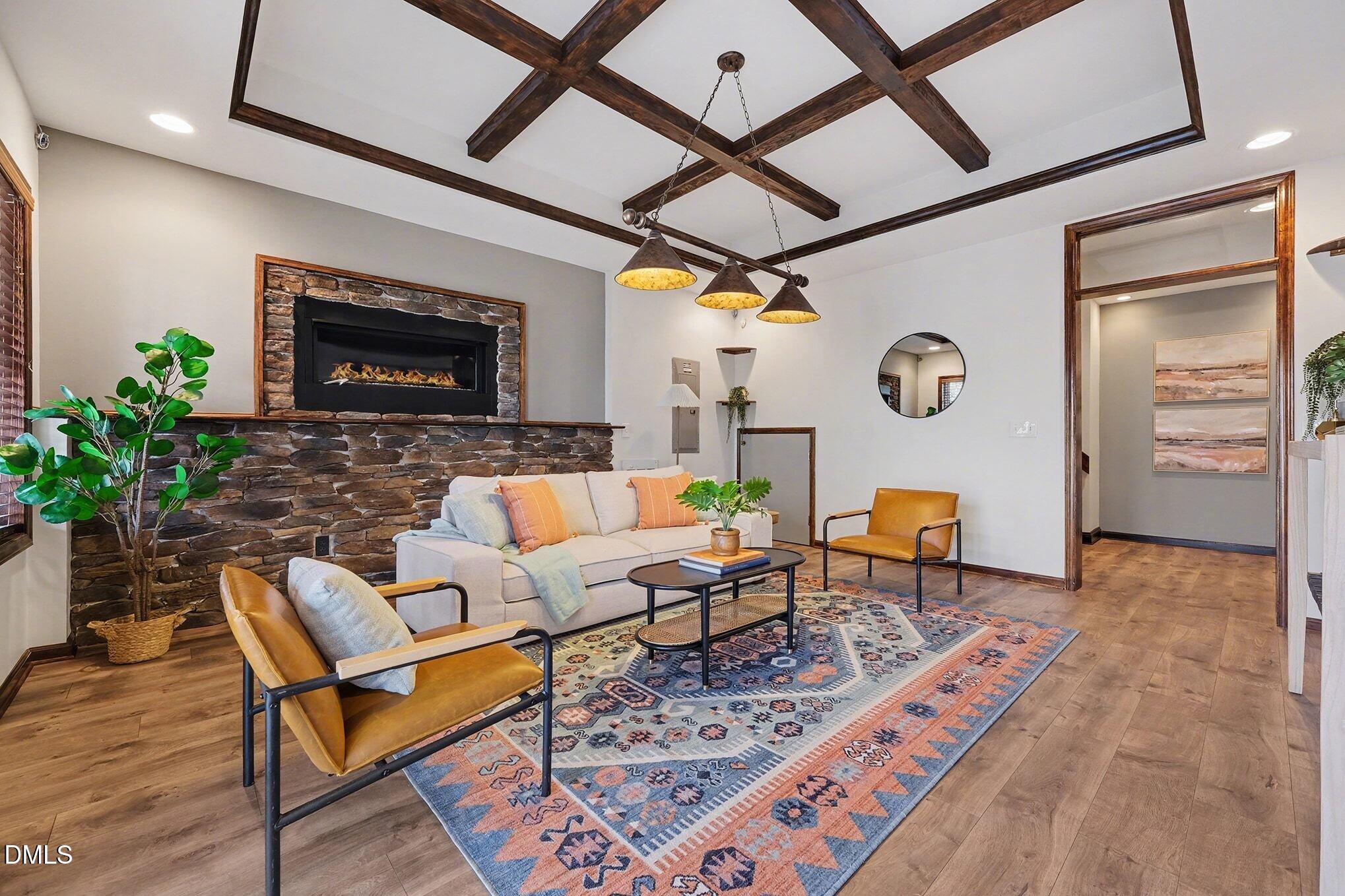29 Chestnut Bluffs Lane Durham, NC 27713 - Photo 24 of 45 a living room with furniture and a wooden floor