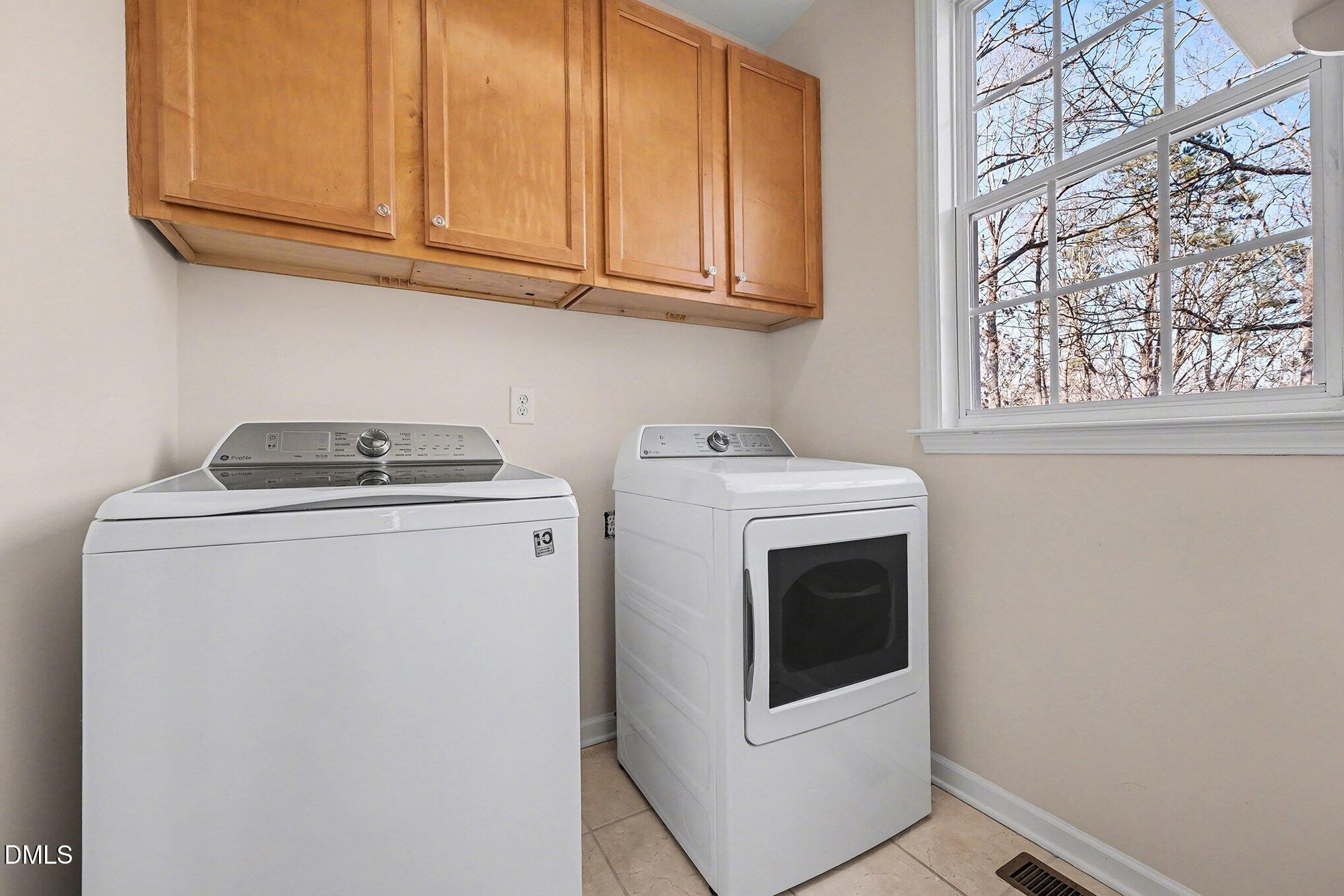 29 Chestnut Bluffs Lane Durham, NC 27713 - Photo 30 of 45 a utility room with dryer and washer