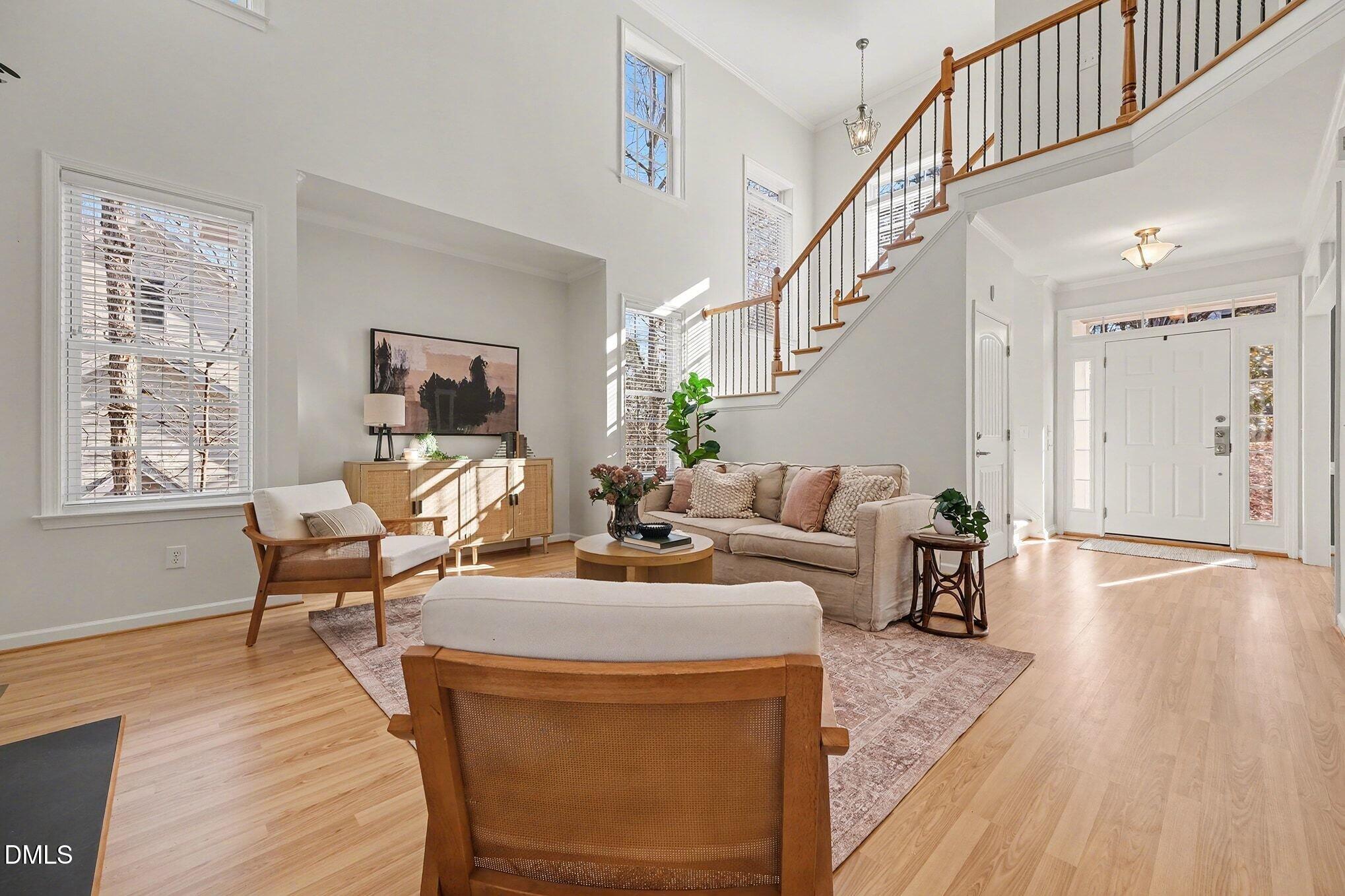 29 Chestnut Bluffs Lane Durham, NC 27713 - Photo 4 of 45 a living room with furniture and a wooden floor