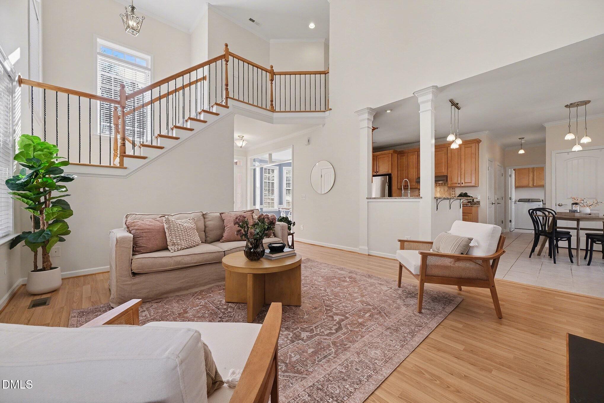 29 Chestnut Bluffs Lane Durham, NC 27713 - Photo 5 of 45 a living room with furniture and wooden floor