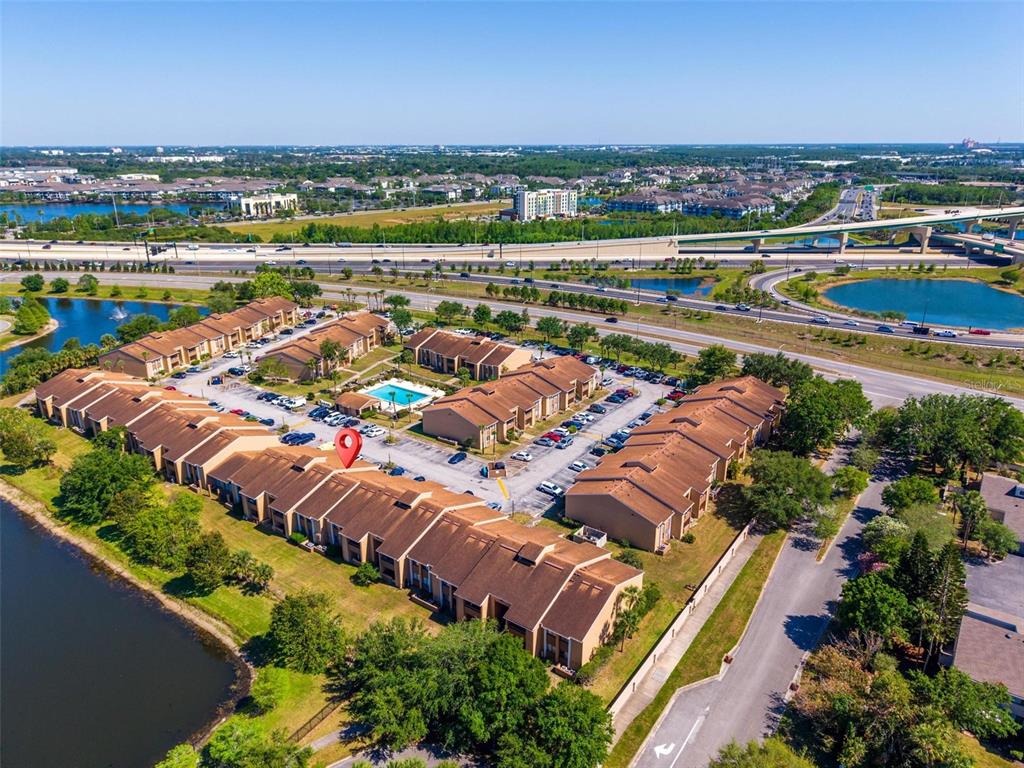 5201 Vineland Road, Unit 112 Orlando, FL 32811 - Photo 23 of 25 an aerial view of a city