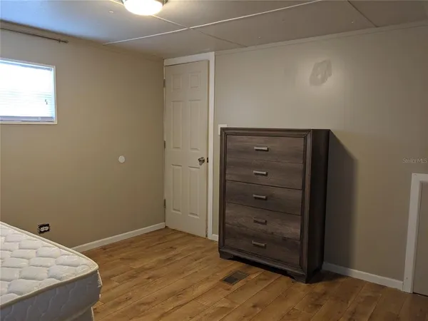 a view of an empty walk in closet