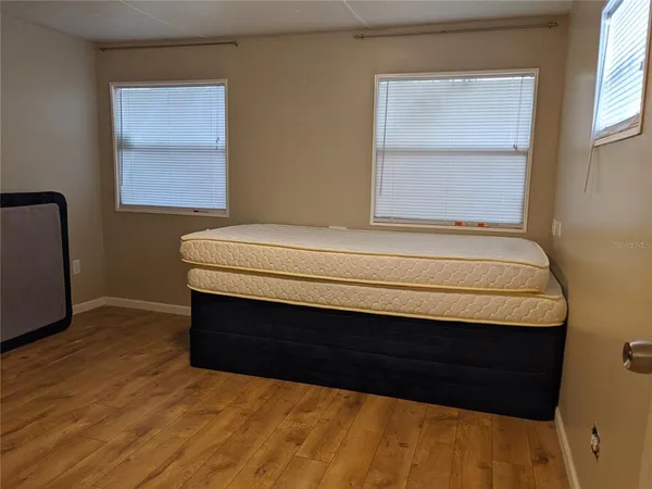 a bathroom with a vanity and a window