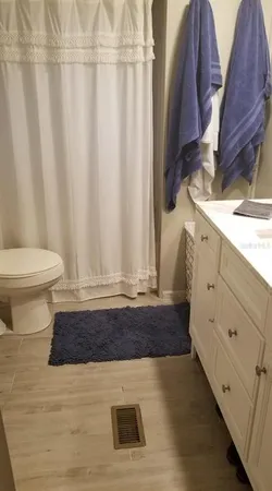 a bathroom with a sink and a toilet