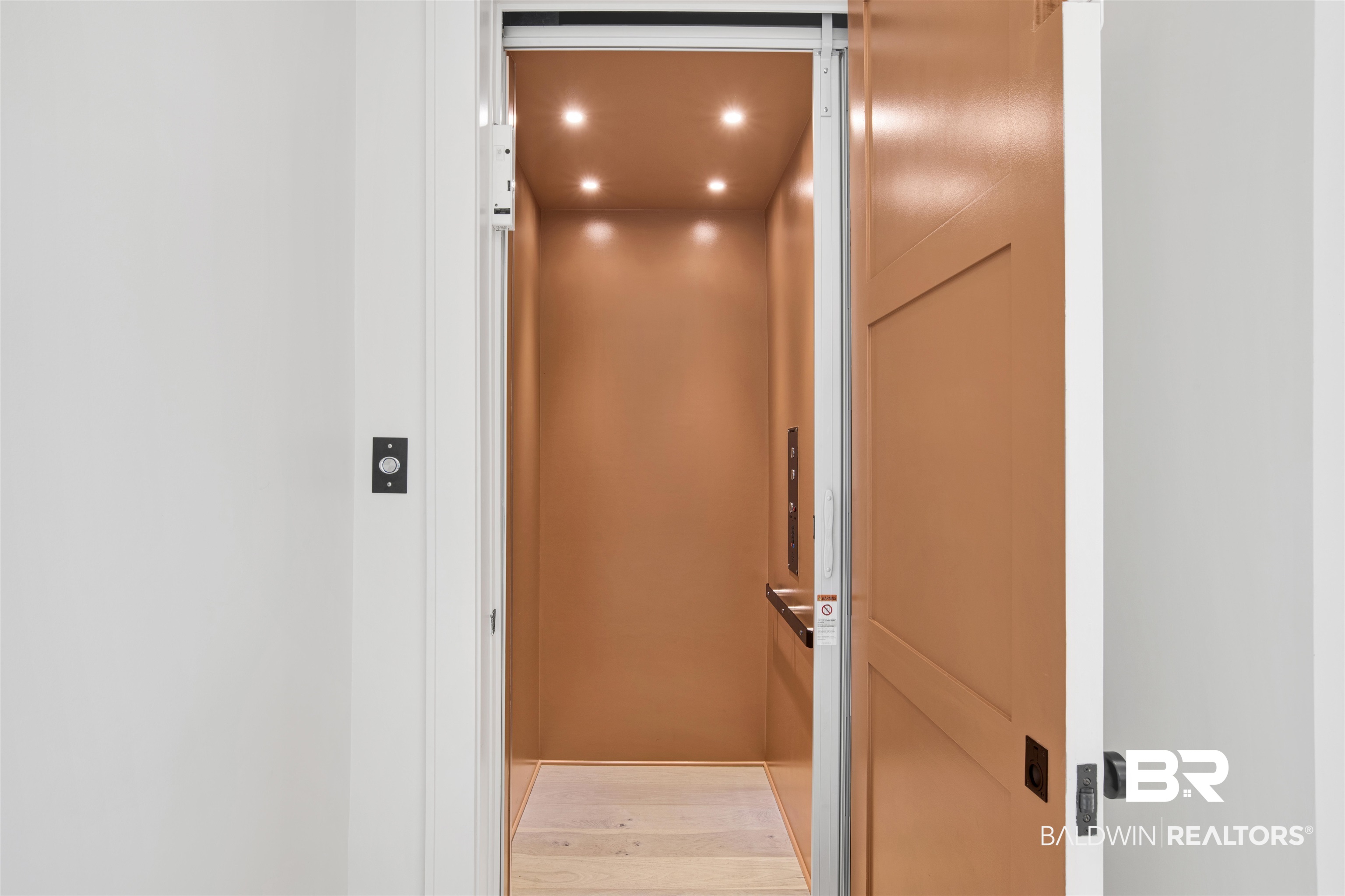 30239 Canal Court Orange Beach, AL 36561 - Photo 10 of 70 Elevator featuring wood finished floors, a barn door, and recessed lighting