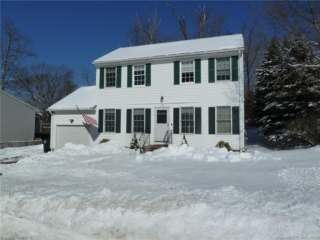 43 Concord Road Torrington, CT 06790 - Photo 1 of 1 a front view of a house with a yard and seating space