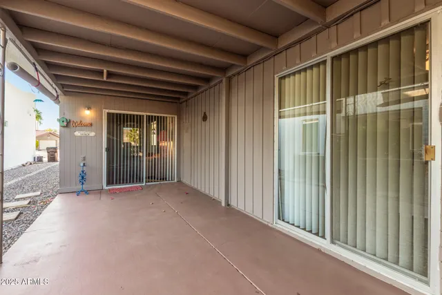 a view of backyard with porch
