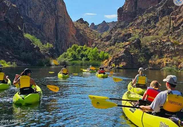 a view of a terrace with a lake view
