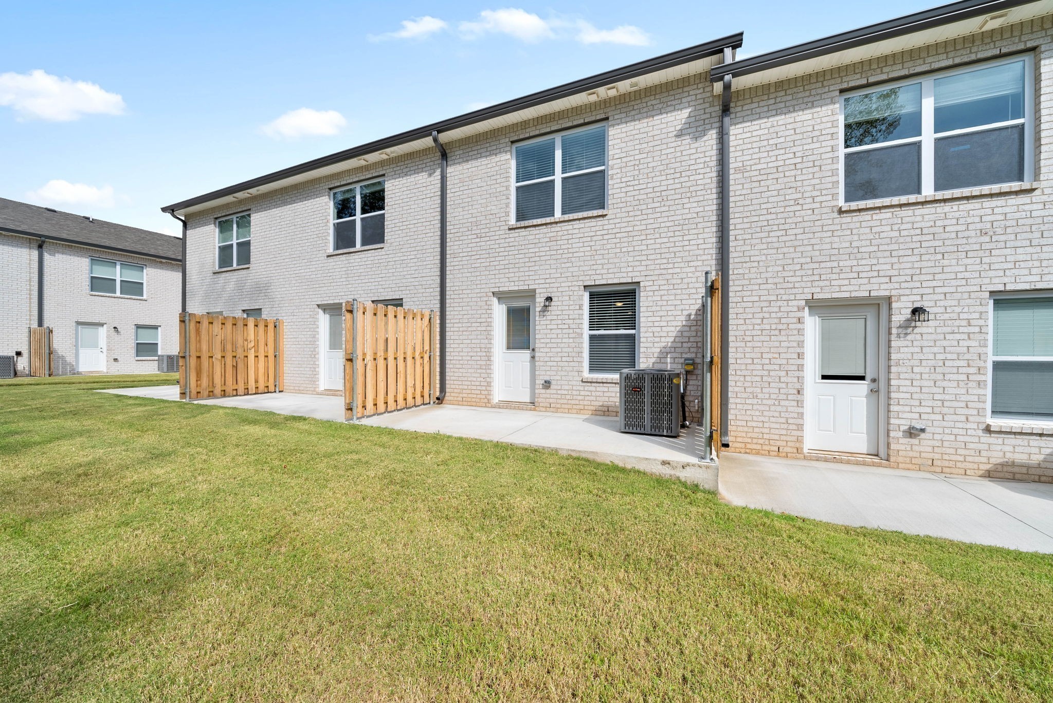 317 Longshadow Trail, Unit F Clarksville, TN 37043 - Photo 26 of 30 a view of a house with a backyard