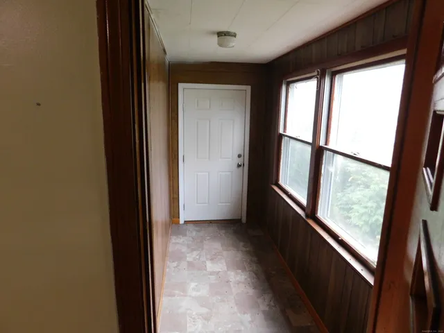 a view of hallway with stairs