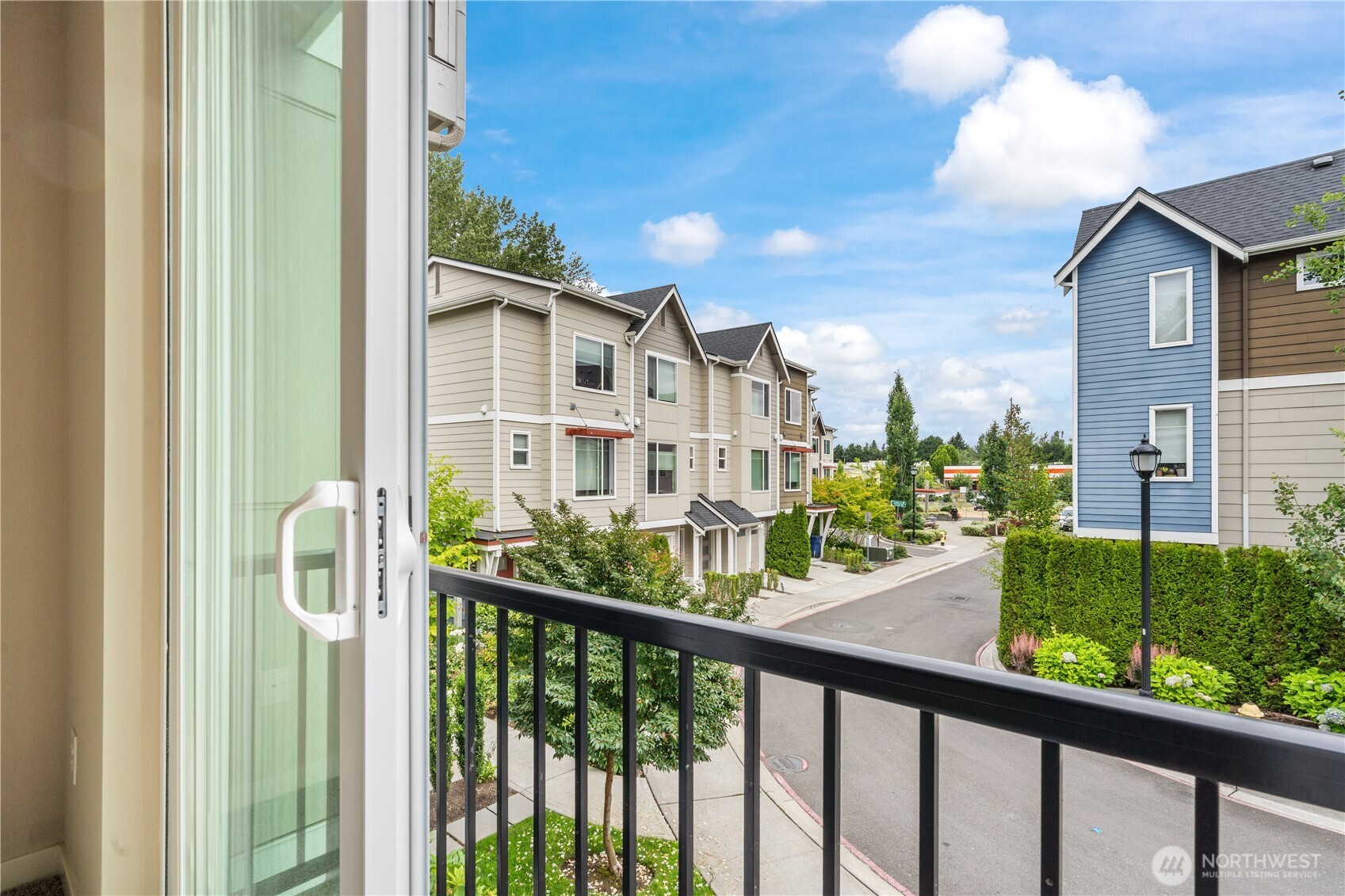 4239 Northeast 3rd Lane Renton, WA 98059 - Photo 16 of 28 a view of a balcony with wooden floor
