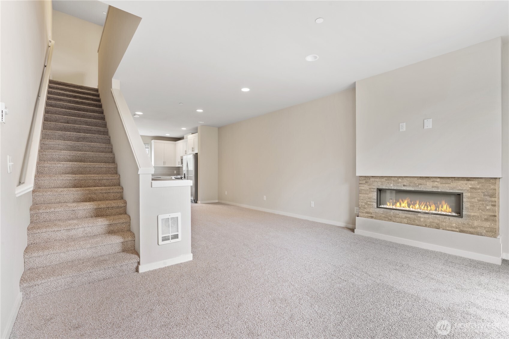 4239 Northeast 3rd Lane Renton, WA 98059 - Photo 17 of 28 an entryway in an empty room with a fireplace