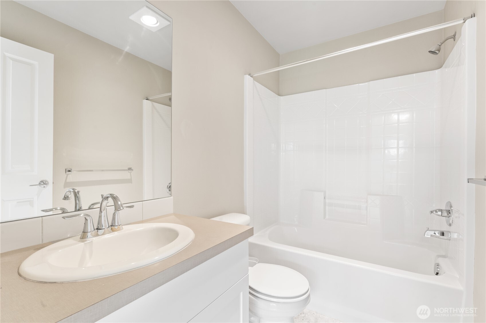 4239 Northeast 3rd Lane Renton, WA 98059 - Photo 21 of 28 a bathroom with a bathtub shower sink vanity and toilet