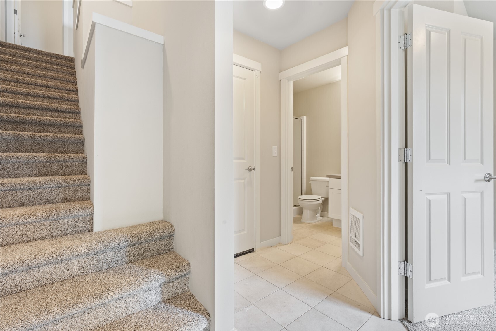 4239 Northeast 3rd Lane Renton, WA 98059 - Photo 4 of 28 a bathroom with a tub and shower