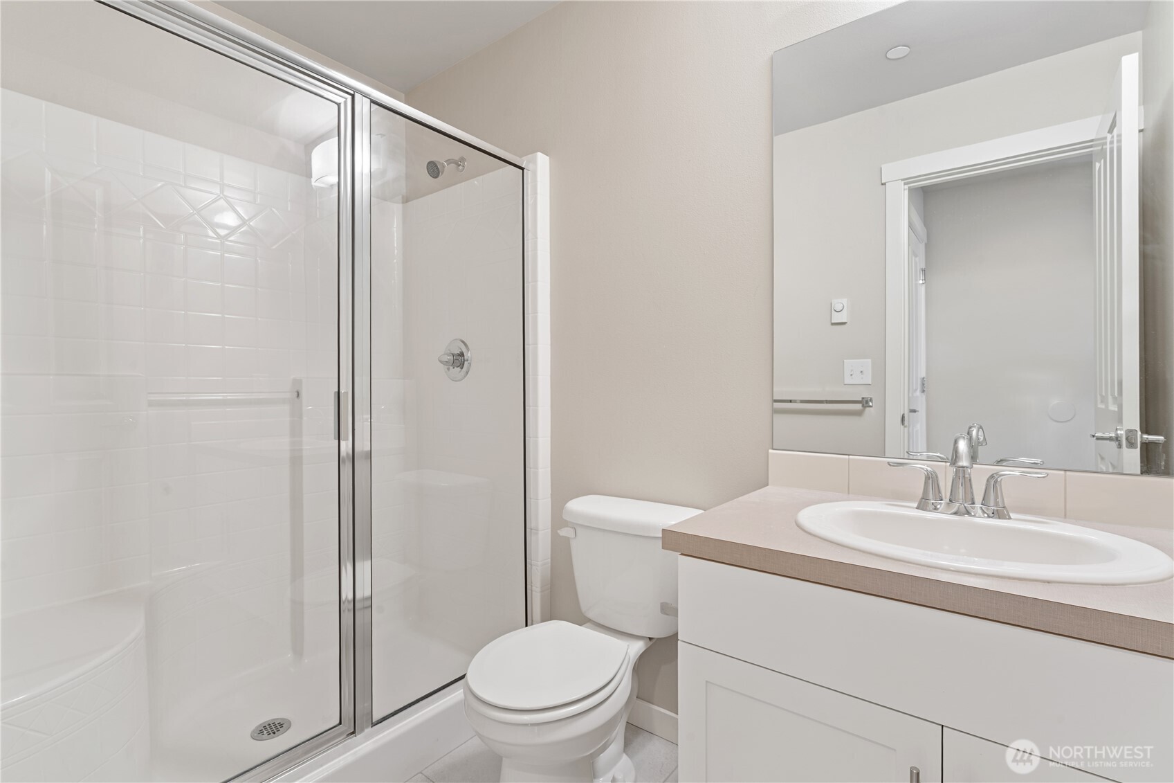 4239 Northeast 3rd Lane Renton, WA 98059 - Photo 5 of 28 a bathroom with a sink toilet and shower