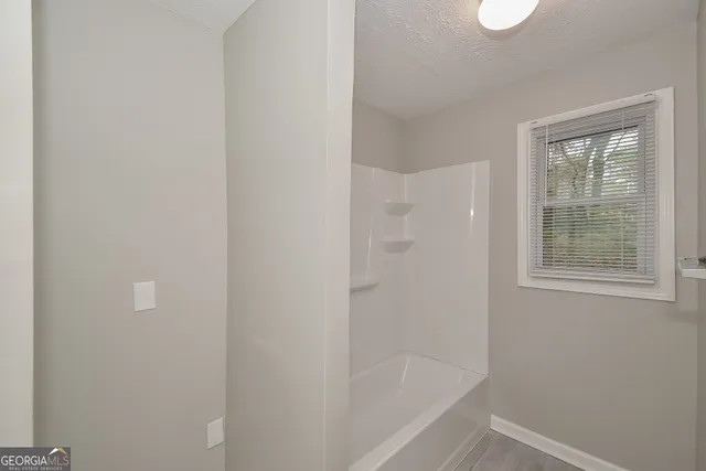 a bathroom with a bathtub