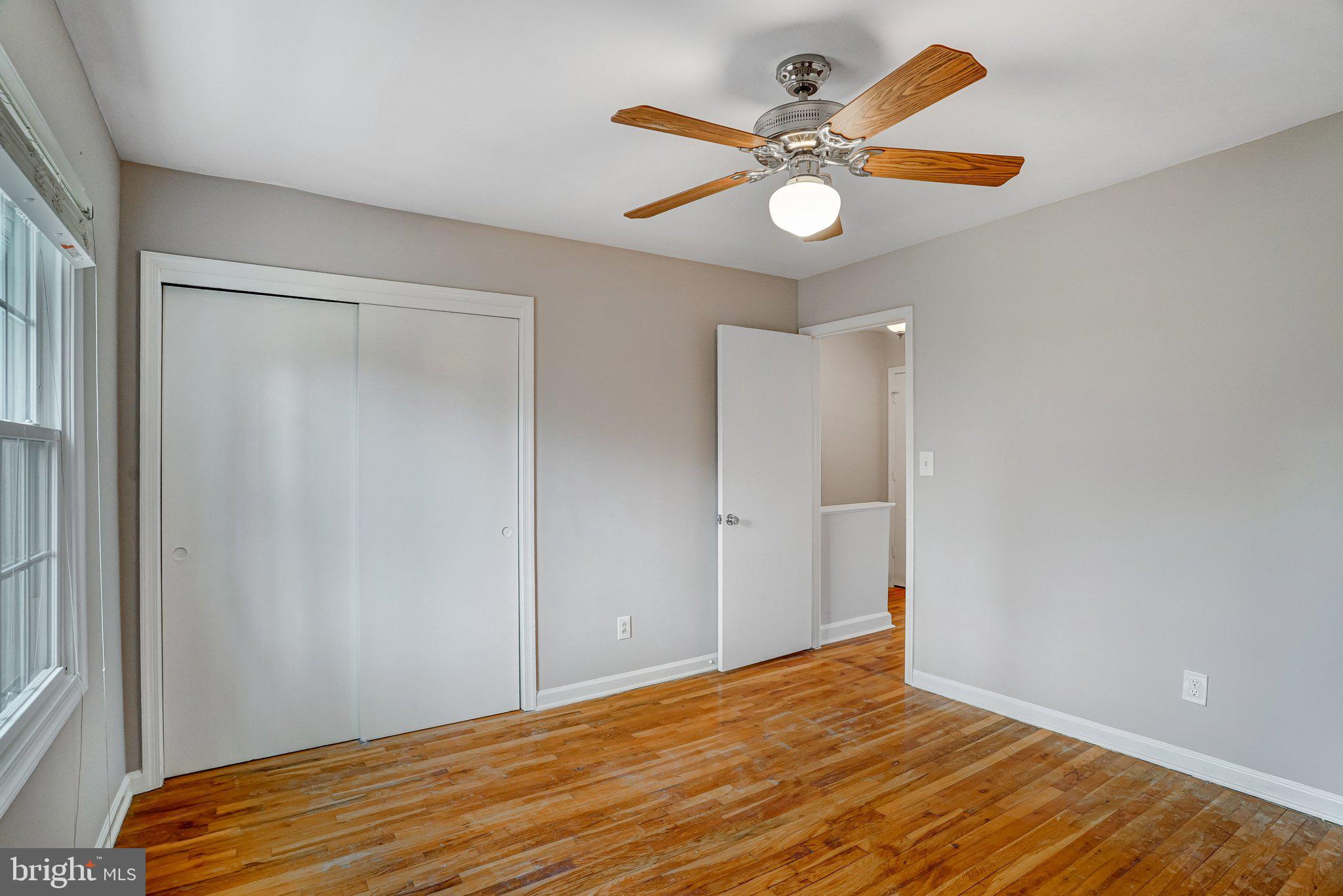 8396 Forrester Boulevard, Unit 555 Springfield, VA 22152 - Photo 16 of 24 a view of empty room with wooden floor