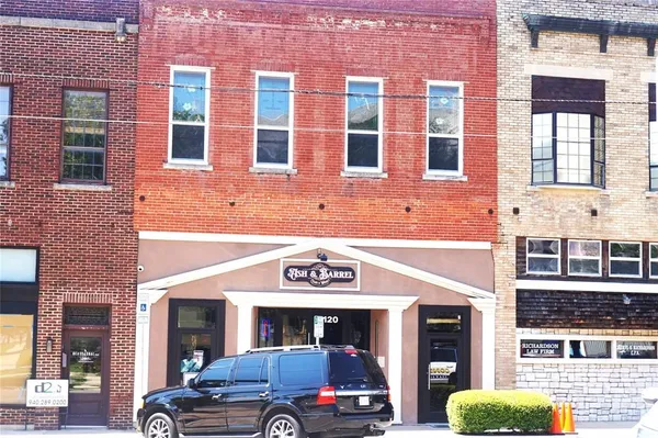 a view of a building with large windows