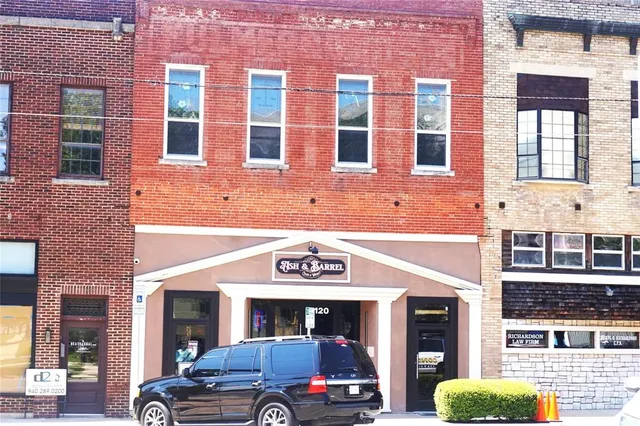 a view of a building with large windows