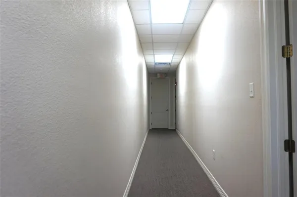 a view of hallway with an entryway