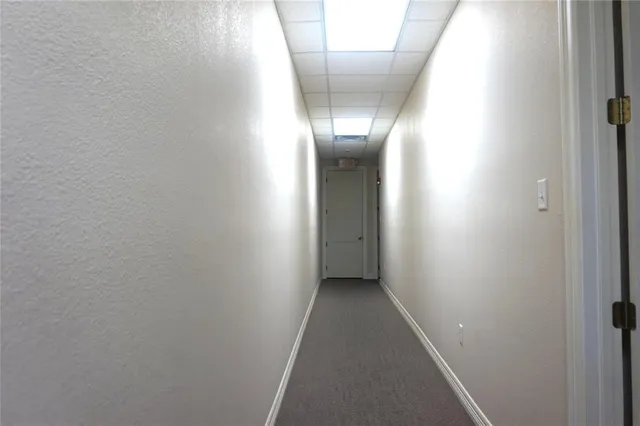 a view of hallway with an entryway