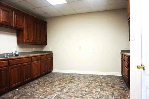 a view of a kitchen with a sink