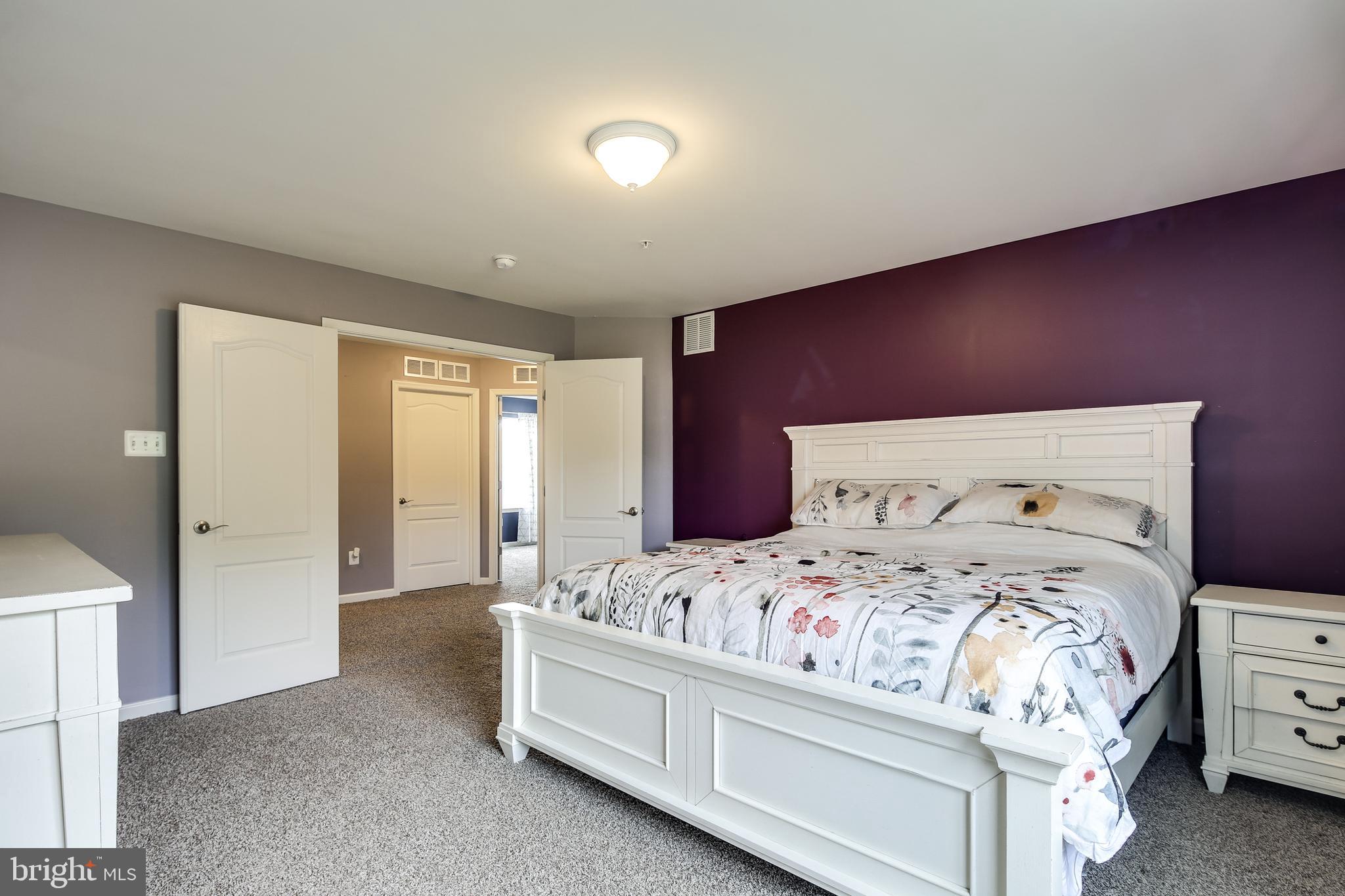 1008 Collier Run Road Baltimore, MD 21220 - Photo 14 of 33 a bedroom with a bed and a dresser