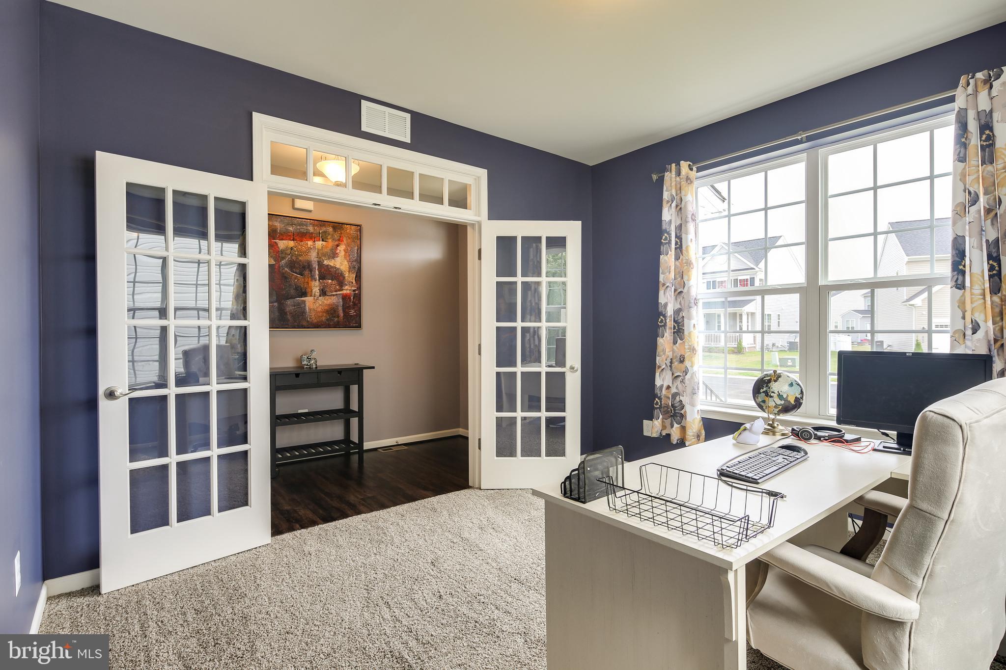 1008 Collier Run Road Baltimore, MD 21220 - Photo 7 of 33 a view of a dining room with furniture and window