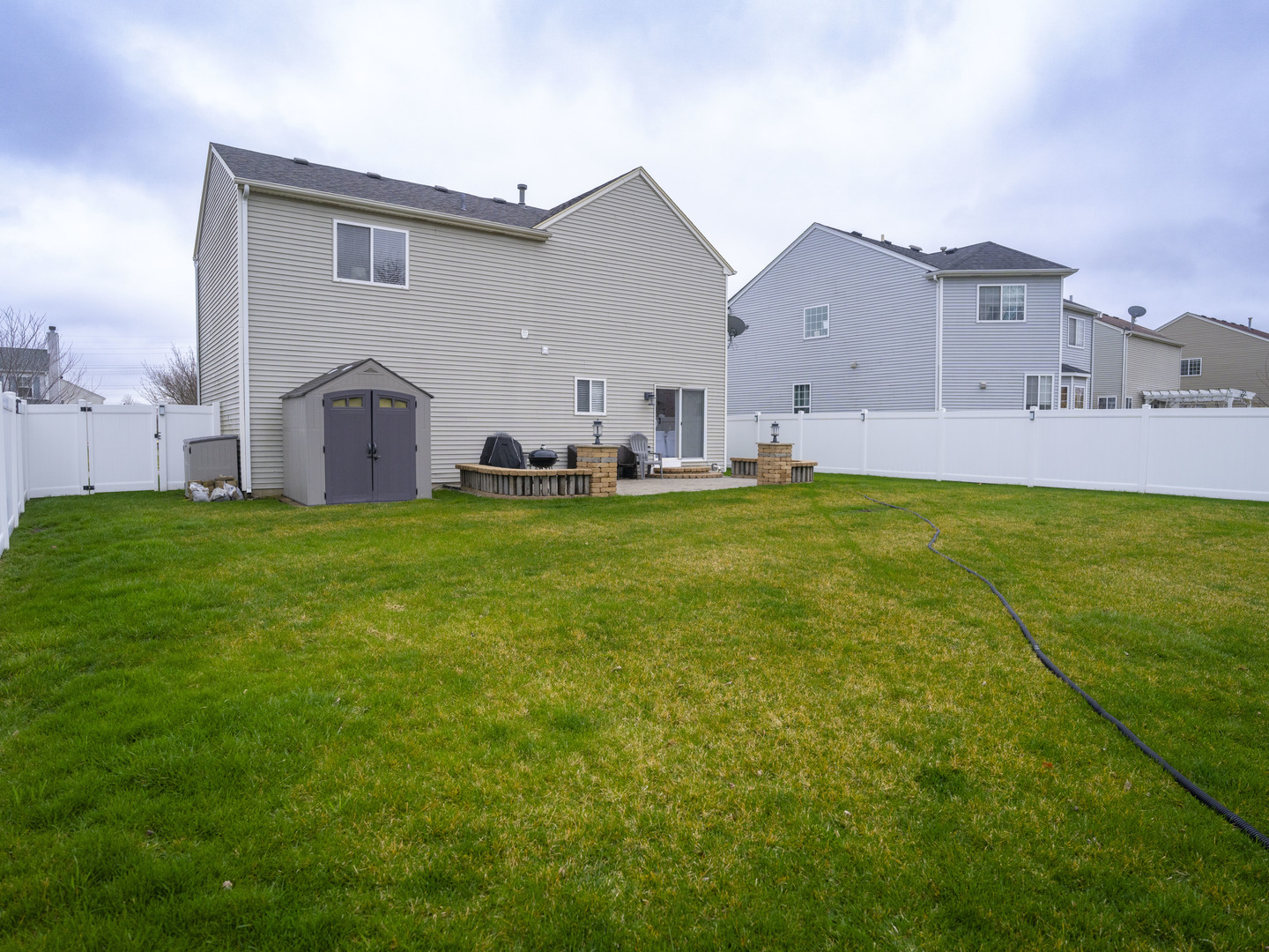 1717 Caton Ridge Drive Plainfield, IL 60586 - Photo 12 of 44 a view of a house with a yard and a large tree