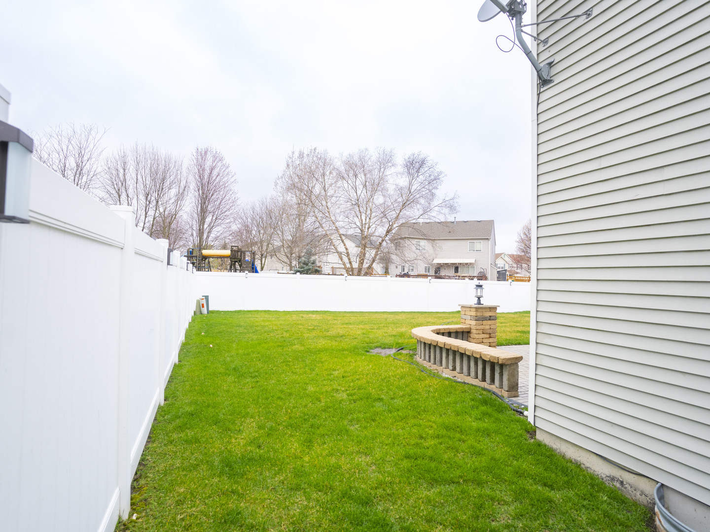 1717 Caton Ridge Drive Plainfield, IL 60586 - Photo 17 of 44 a view of a house with a backyard and a patio