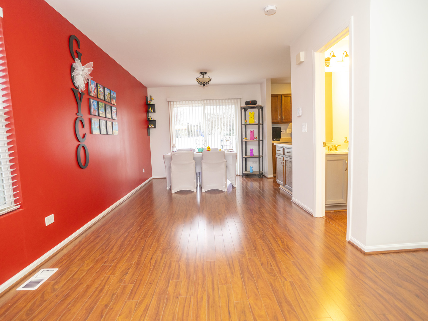 1717 Caton Ridge Drive Plainfield, IL 60586 - Photo 26 of 44 a view of a livingroom with furniture and wooden floor