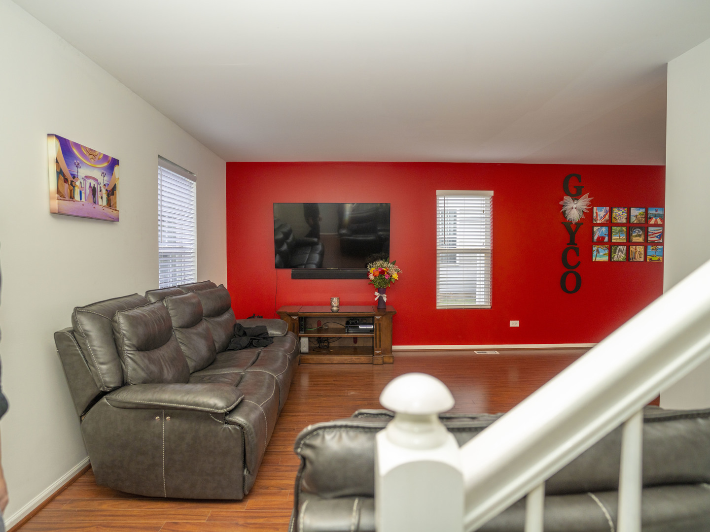 1717 Caton Ridge Drive Plainfield, IL 60586 - Photo 30 of 44 a living room with furniture and a flat screen tv