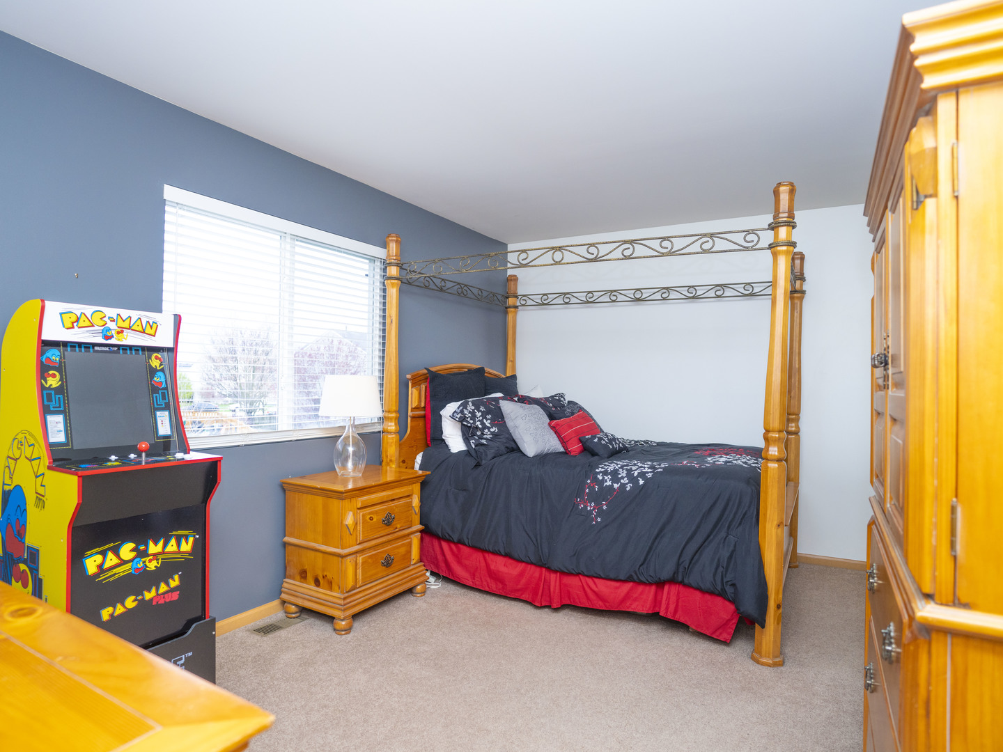 1717 Caton Ridge Drive Plainfield, IL 60586 - Photo 36 of 44 a bedroom with a bed and a window