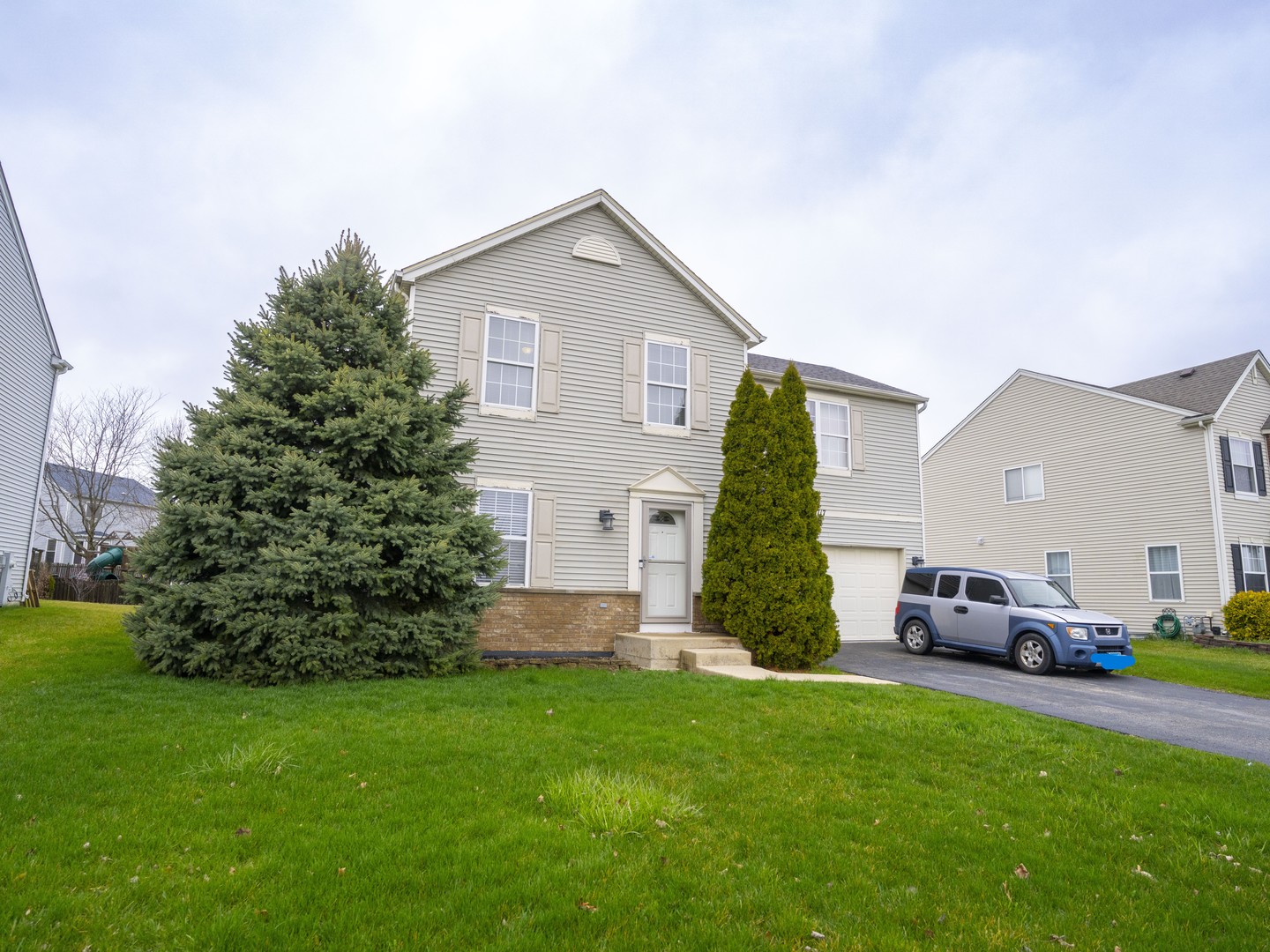 1717 Caton Ridge Drive Plainfield, IL 60586 - Photo 4 of 44 a view of a house with a back yard