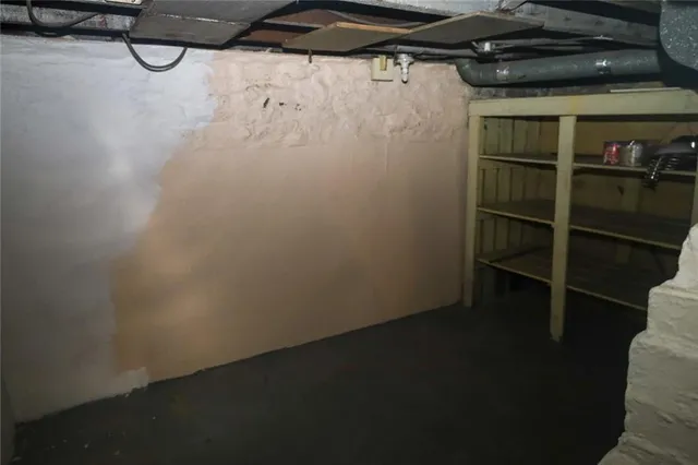 a view of a room with racks on the wall