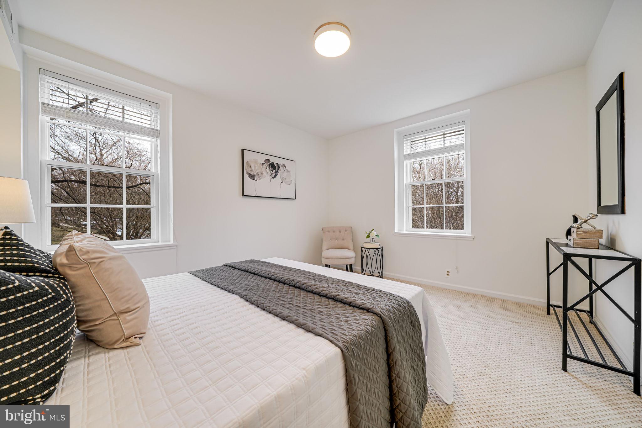 3701 39th Street Northwest, Unit A181 Washington, DC 20016 - Photo 16 of 68 a bedroom with a bed and a window