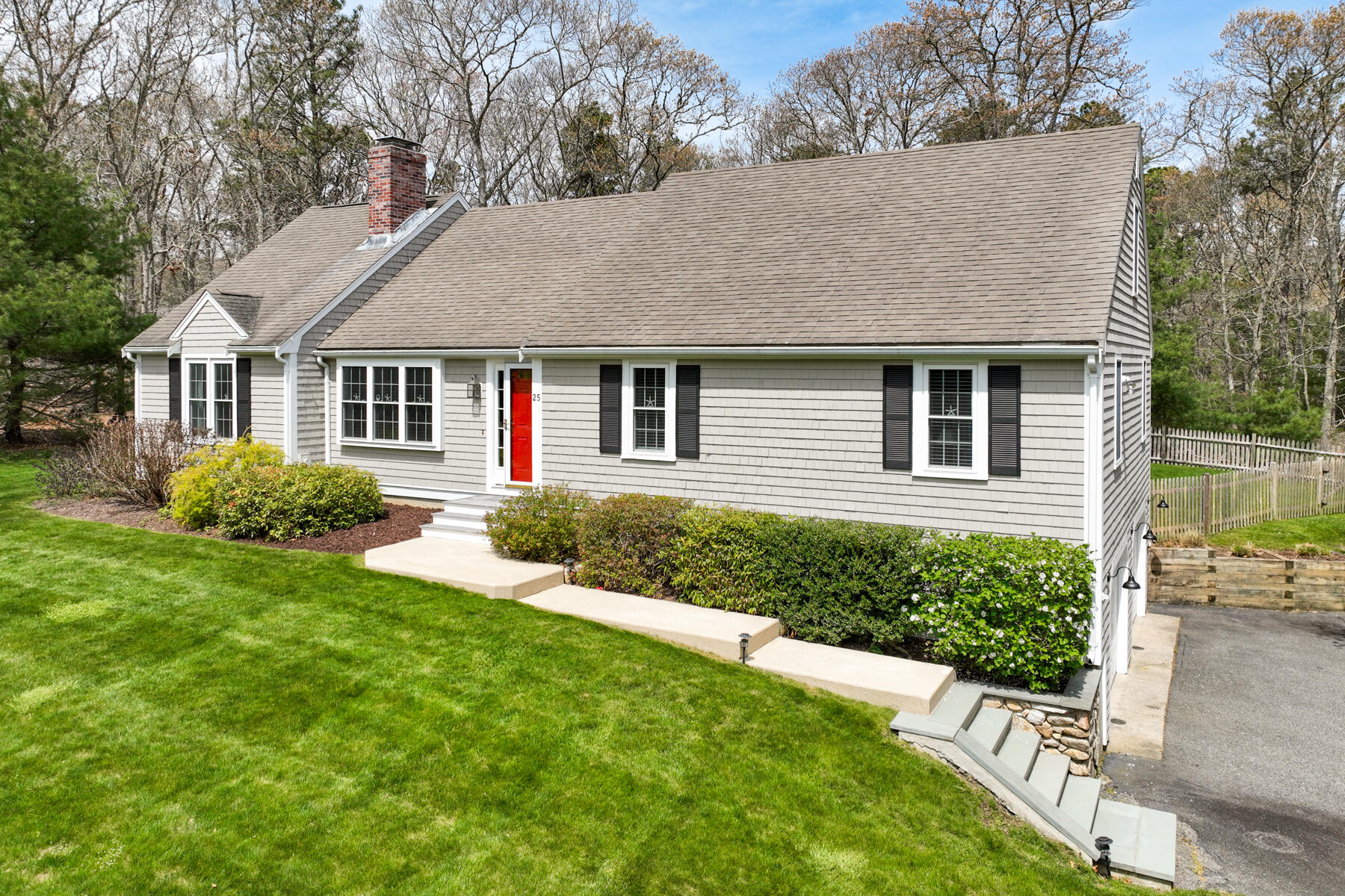 25 Peach Tree Road Marstons Mills, MA 02648 - Photo 1 of 33 a front view of a house with a yard