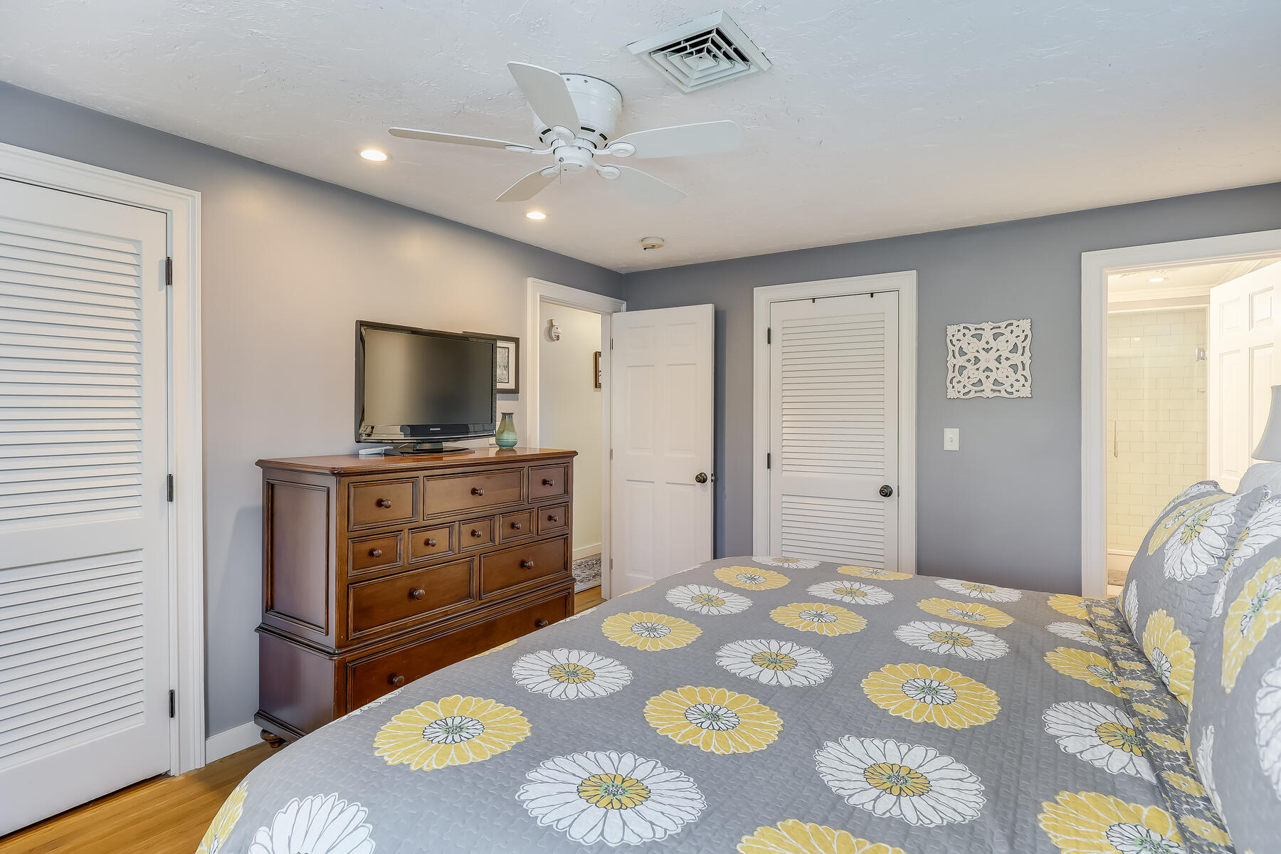 25 Peach Tree Road Marstons Mills, MA 02648 - Photo 16 of 33 a bedroom with a bed and a flat screen tv