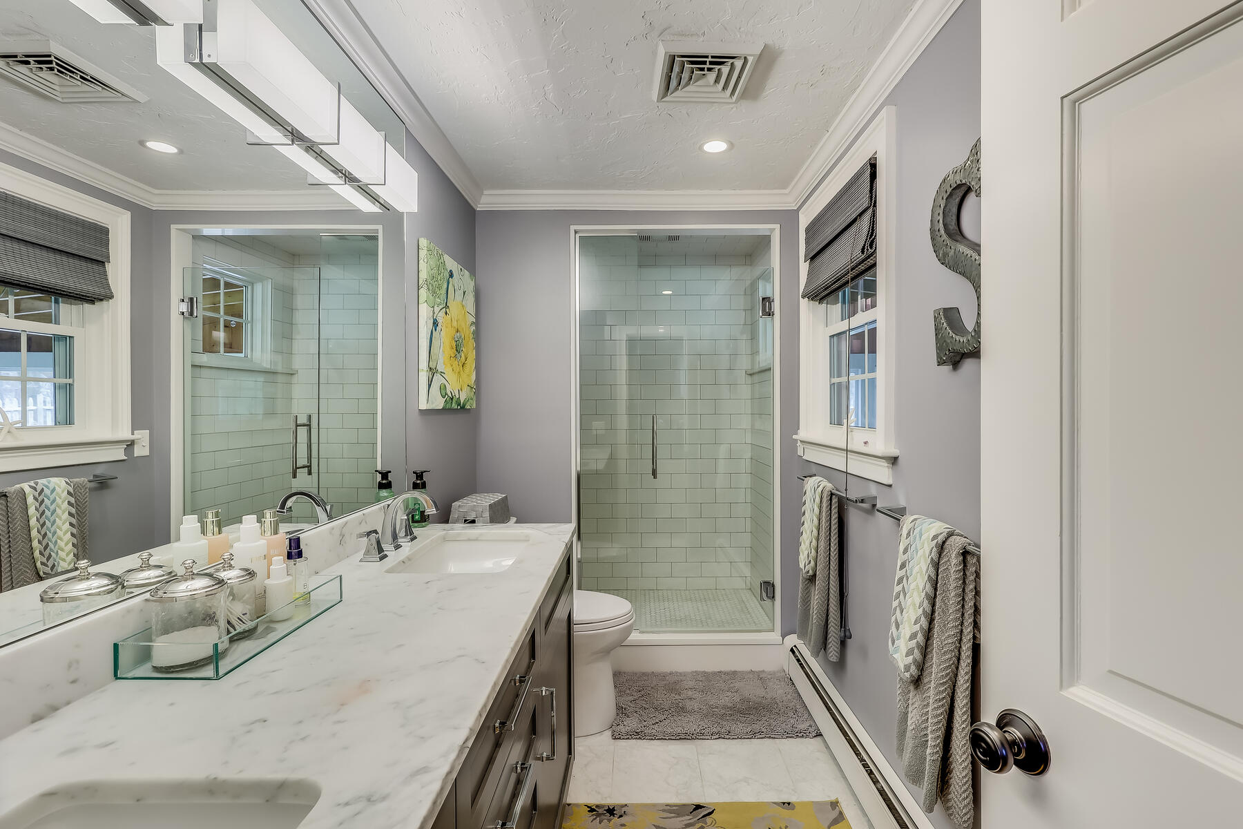 25 Peach Tree Road Marstons Mills, MA 02648 - Photo 17 of 33 a bathroom with double vanity sink and a mirror