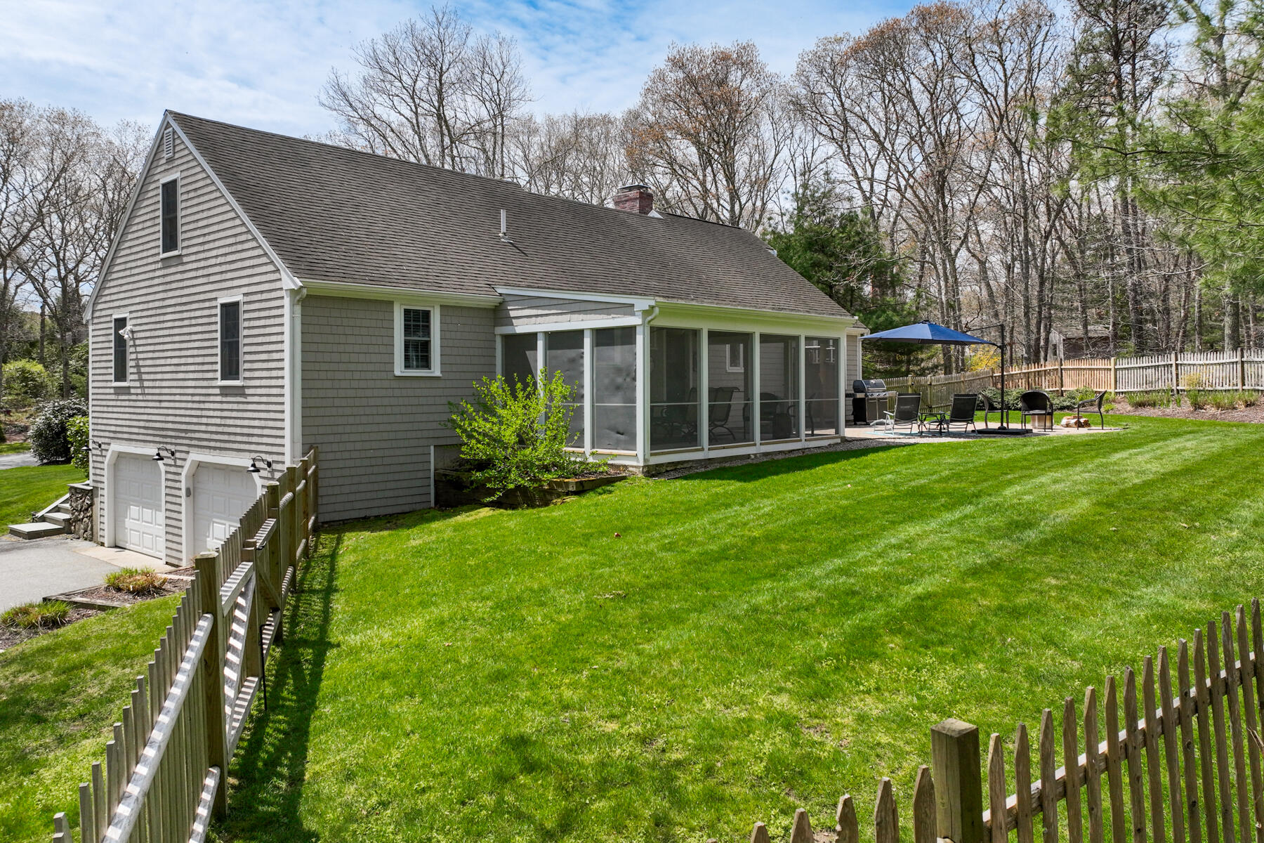 25 Peach Tree Road Marstons Mills, MA 02648 - Photo 29 of 33 a view of a house with a yard and sitting area
