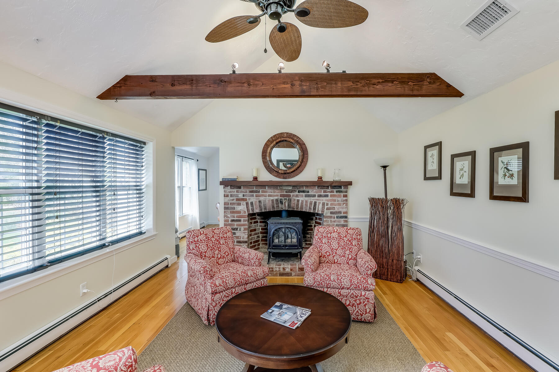 25 Peach Tree Road Marstons Mills, MA 02648 - Photo 7 of 33 a living room with furniture and a fireplace