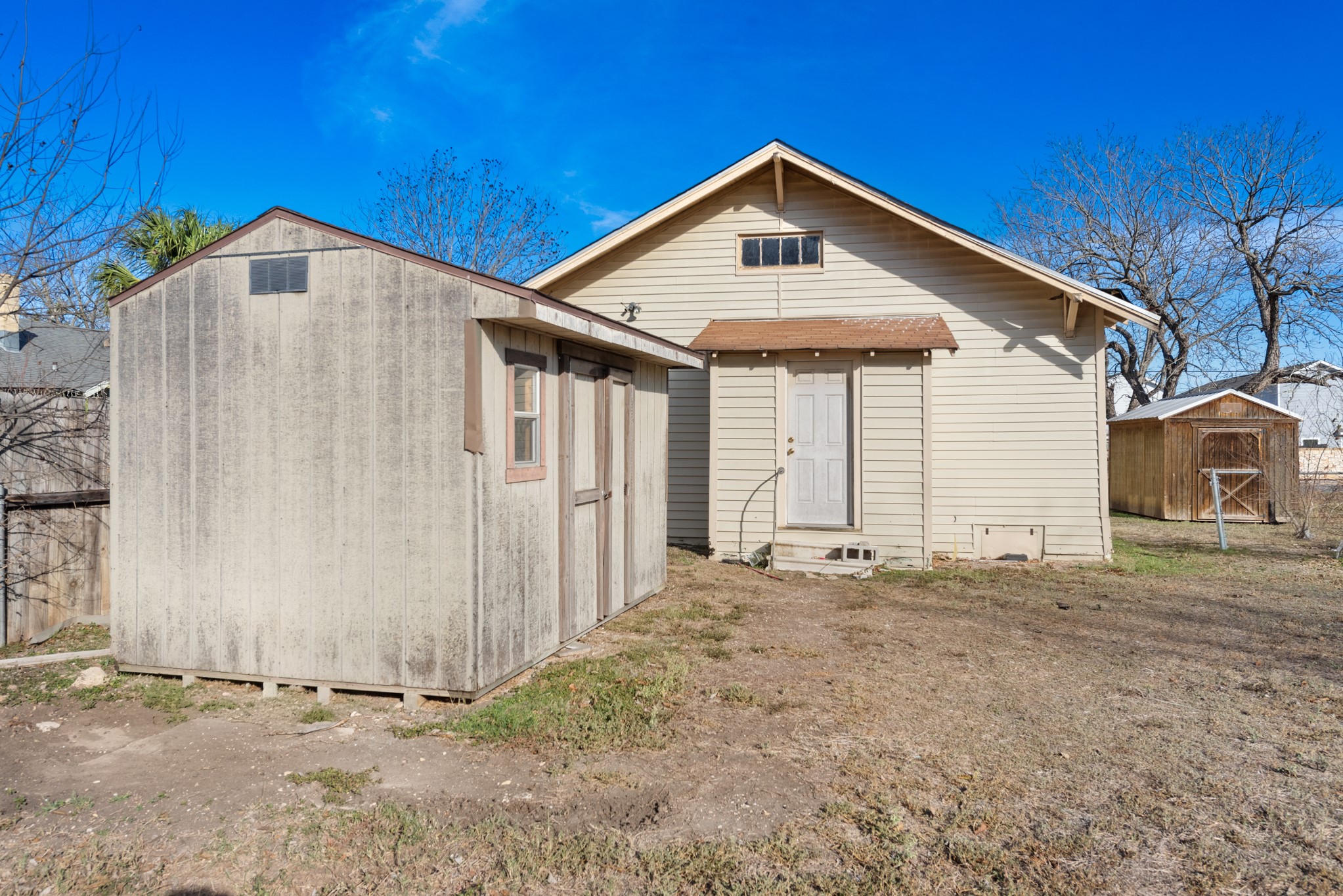 917 Trinity Street Lockhart, TX 78644 - Photo 13 of 13 a front view of a house with a yard