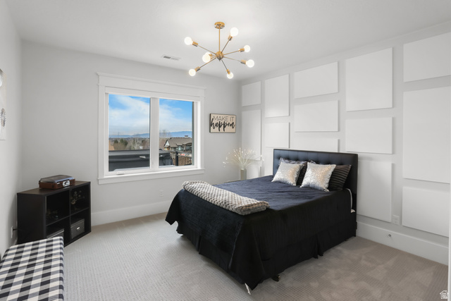 1354 South 800 East Mapleton, UT 84664 - Photo 53 of 129 Bedroom featuring hanging lights and light carpet