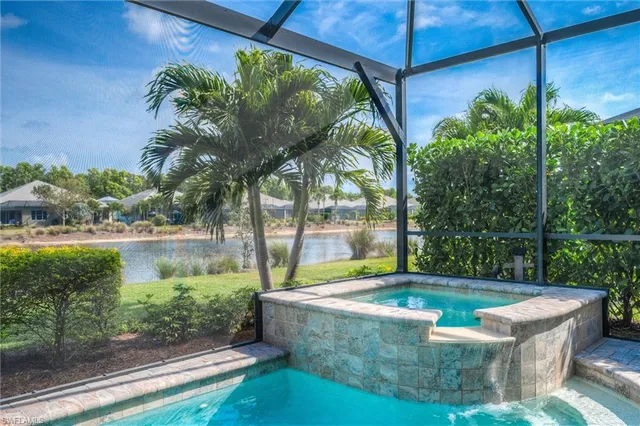 a view of a swimming pool with a patio